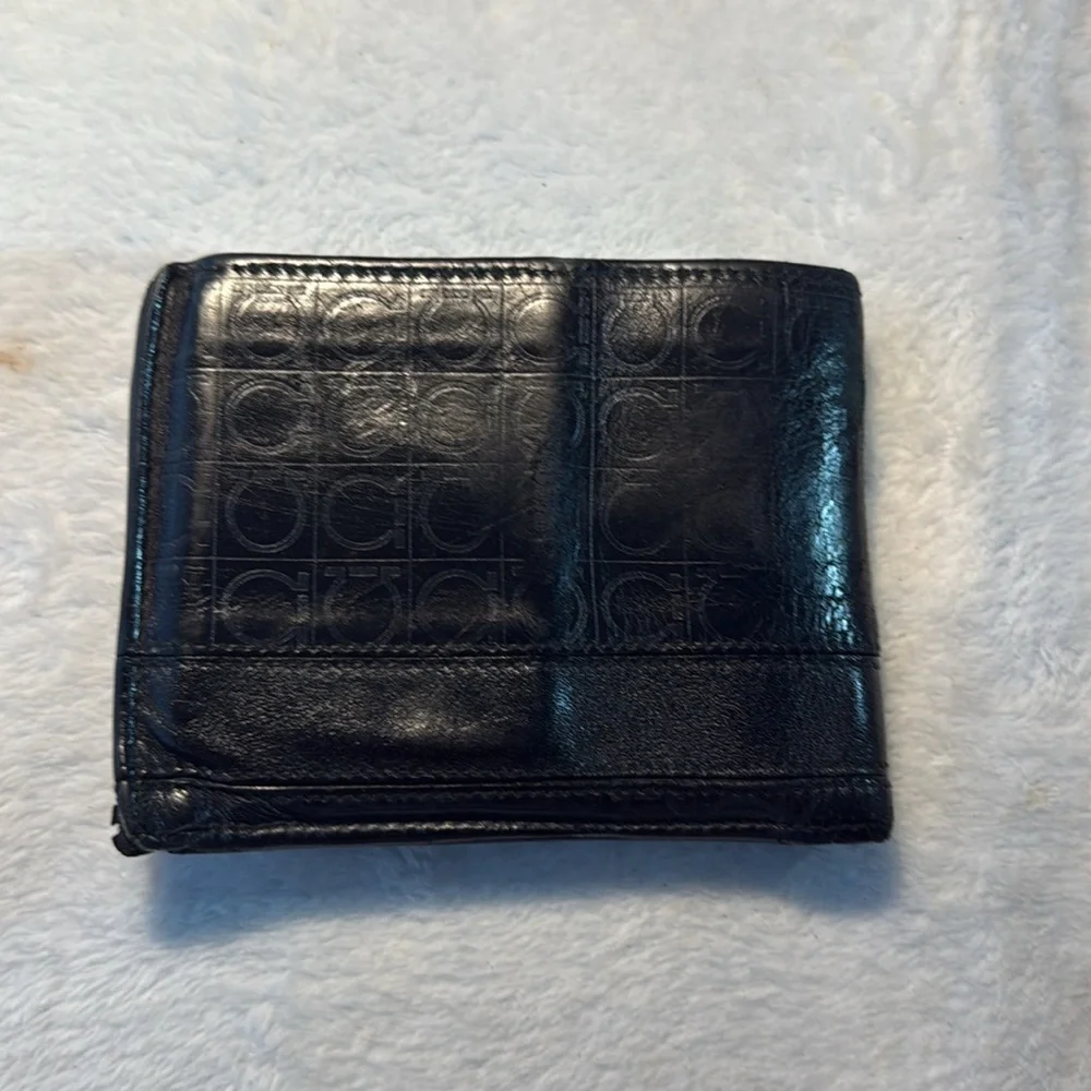 Salvador Ferragamo black bifold wallet.